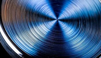 Close-up View of a Metallic Surface With Intricate Circular Patterns Reflecting Light in a Studio Setting photo