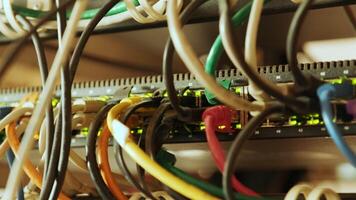 Network switch and ethernet cable in rack cabinet. Network connection technology and has a status LED to show working status. Concept of infrastructure with cables connected to data center 11 video