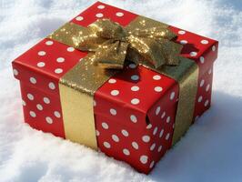 Red Gift Box in the Snow. photo