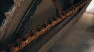 A close up of a chain on a machine photo