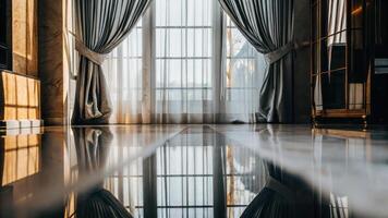 A room with a window and a large mirror photo