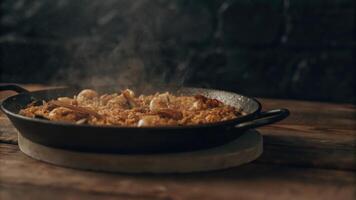 A pan with food in it on a table photo