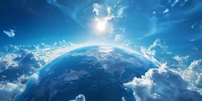 Earth viewed from space surrounded by white clouds under a radiant sun, symbolizing global unity, environmental beauty, and the vastness of our planet in the cosmos photo