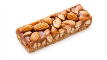 Delicious nut caramel bar topped with crunchy almonds, perfect for a snack. photo