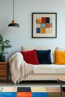A colorful rug and couch in a living room photo