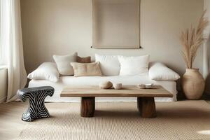A white couch and a zebra print stool in a room photo