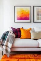 A white couch with colorful pillows and a rug photo