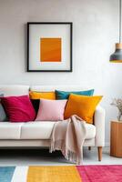 A colorful rug and couch in front of a painting photo
