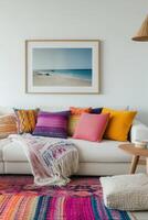 A colorful rug is in front of a white couch photo