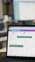 Vertical Package tracking software displayed on laptop screen in call center logistics department. Notebook in office showing app doing parcels shipment monitoring, searching for items lost in transit video