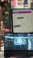 Vertical Call center agents track shipments in office using AI chatbot for help. Customer center workers use artificial intelligence assistance to locate clients packages and provide status updates, camera A video