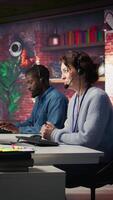 Vertical Worker providing live chat support, typing on keyboard, handling clients complaints. Call center agent dealing with unsatisfied customers, providing helpful solutions to their concerns, camera B video