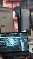 Vertical Call center employee using AI chatbot at office desk to reply to common customer queries, close up. Customer service staff member at work generates automated responses to clients using AI, camera A video