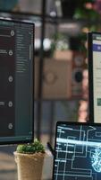 Vertical Call center worker in office uses AI LLM assistant to reply to customer queries. Woman doing customer service job generating automated responses to clients using artificial intelligence tech, camera A video