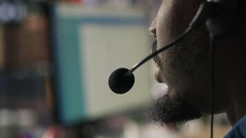 Closeup of call center agent providing support, handling clients complaints, speaking in audio headset mic. Employee dealing with unsatisfied customers, talking in headphones mic, camera A video