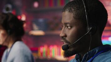 Closeup of customer support worker conversating with client in live chat, providing solutions. Call center agent assists customers through digital communication channels, answering questions video