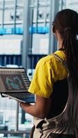 Vertical Engineering team working in smart factory, collecting and analyzing data. Teamworking colleagues using tracking software in industry 4.0 industrial plant equipped with advanced sensors, camera A video