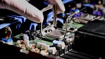 CPU, Processor installation. Semiconductor components in the high technology sector. Printed circuit board with chipset. video