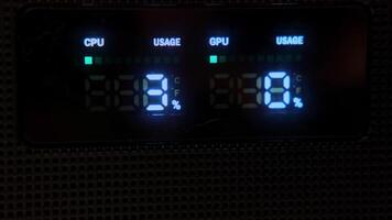 Gaming computer with load indicator. Computer performance and power load panel close-up. video