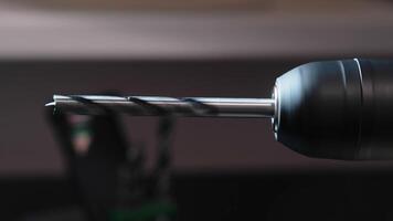 Rotating drill. Electric drilling machine with fixed drill bit for wood. video