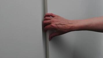 a hungry woman looks into the refrigerator and checks that it is empty. woman looking into an empty fridge video