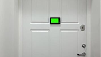 green screen of a peephole or intercom on the front door. surveillance system for home. video