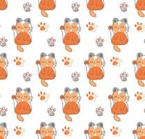 a pattern with cats and paw prints vector