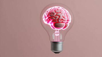 A realistic light bulb rotates on a pink background, gradually revealing a glowing pink human brain inside video