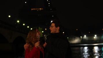 Romantic Couple with Champagne Under Eiffel Tower Lights video