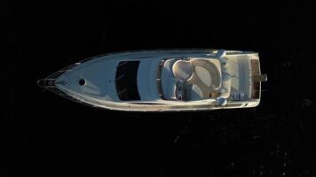A Stunning Aerial View Capturing a Luxury Yacht Sailing Over Dark Waters in Tranquil Ocean video