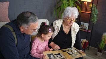 Three generations connect as they explore a family album filled with memories video