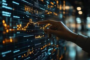 Analyzing stock market data with hand pointing at financial chart for investment strategy and trends photo