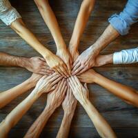 Diverse group hands together teamwork collaboration unity partnership support community success achievement photo