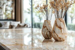 Elegant marble vases with dried flowers on a polished tabletop design photo