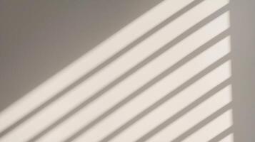 Diagonal Light Shadows on Beige Wall forming a clean and elegant pattern with warm tones and smooth gradients for modern aesthetics. photo