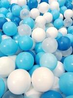 White and bright blue balls with a shiny and colorful pattern, Close-up photo