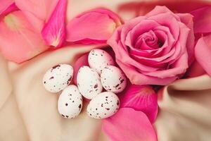 roses and eggs scattered among rose petals on beige fabric create a lovely photo