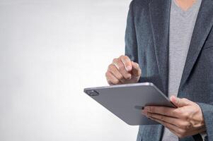 Professional Man Using Tablet Device in Modern Business Setting photo