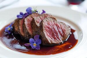 Beef Tenderloin in Gourmet Plating with Artistic Culinary Touch photo
