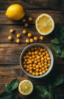 Roasted chickpeas with turmeric and lemon on rustic wooden table photo