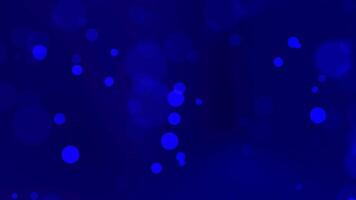 A blue background with many small circles video