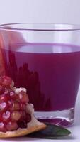isolated Pomegranate juice with pomegranate fruit video
