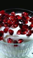 yogurt fruit Pomegranate isolated seeds tropical texture background video