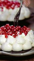 meringues pavlova cake with pomegranate background video