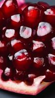 Rotating pomegranate Seeds on black background isolated video