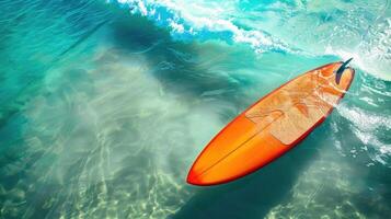 surfing, bright orange surfboard, foam sea wave, top view, horizontal banner, blue summer beach background, copy space, free space for text photo
