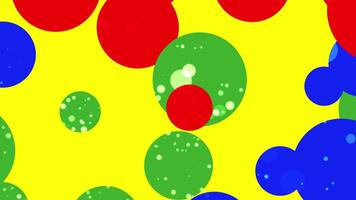 Cheerful overlapping circles displaying red and green on yellow background. Festive design concept video