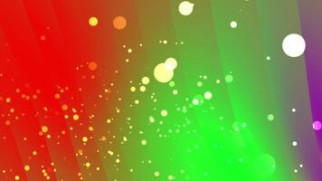 Vibrant gradient bokeh lights glowing in red and green hues. Festive design concept video