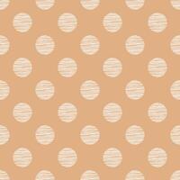 Seamless dot pattern on beige background. vector