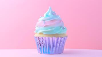 Iridescent Cupcake with Rainbow Icing and Metallic Foil Liner photo
